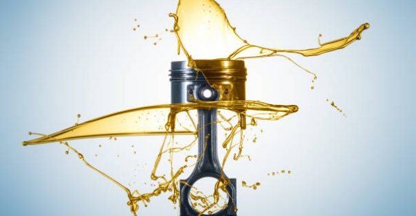Piston and connecting rod are thrown with oil. Engine oil concept - Oil Splash